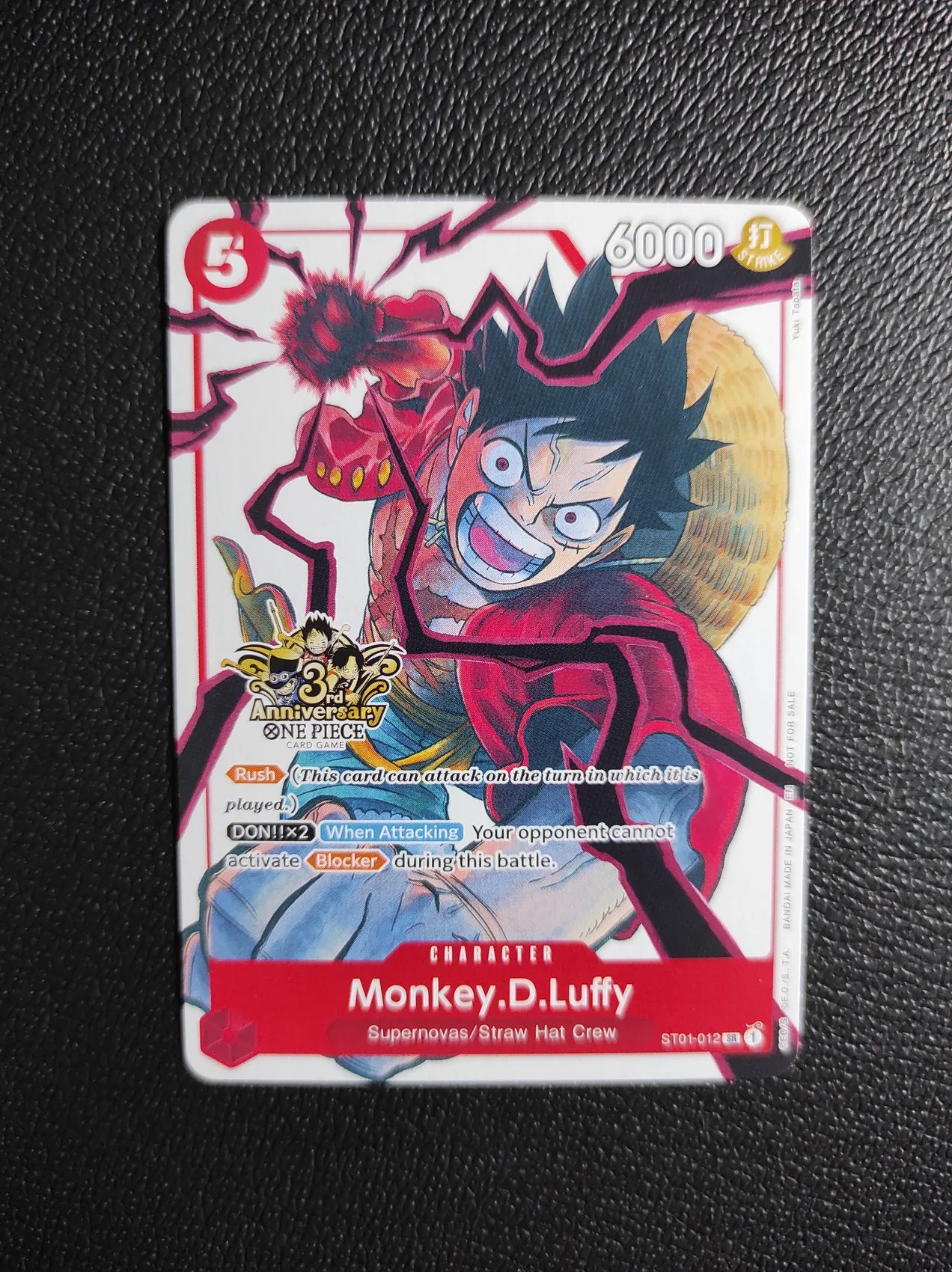 ST01-012 | Monkey D Luffy Black Clover 3rd Anniversary
